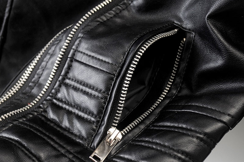 Edgy black women's biker jacket with sleek zippers. Chic outerwear, a versatile statement for spring & fall fashion.