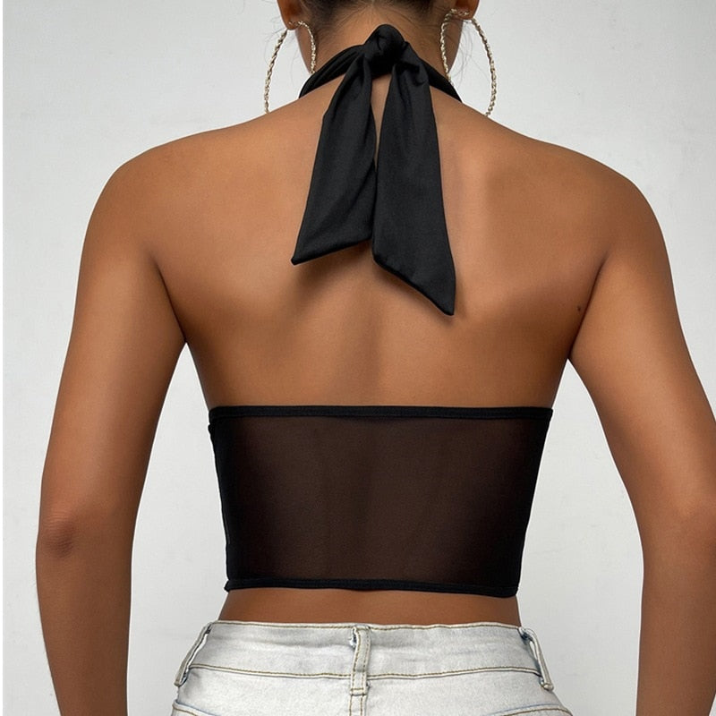 Elegant black women's halter top featuring a unique cross design, perfect for a fashionable look.