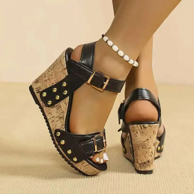 Side view of black women's comfortable buckle wedges showing orthopedic support.