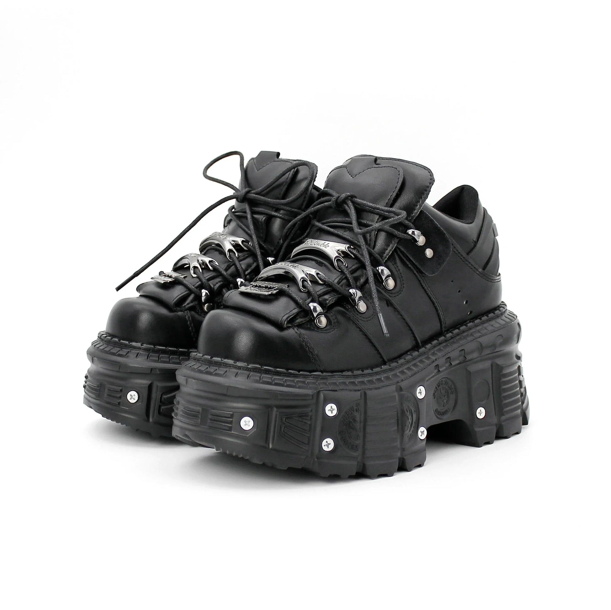 Black women's punk platform boots with bold lace-up design, perfect for edgy style & rebel fashion.