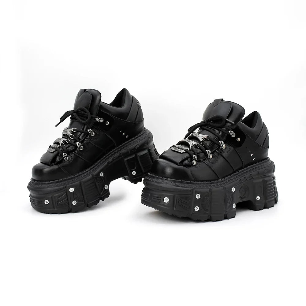 Durable black leather-look women's punk platform boots featuring a prominent lace-up and thick sole.