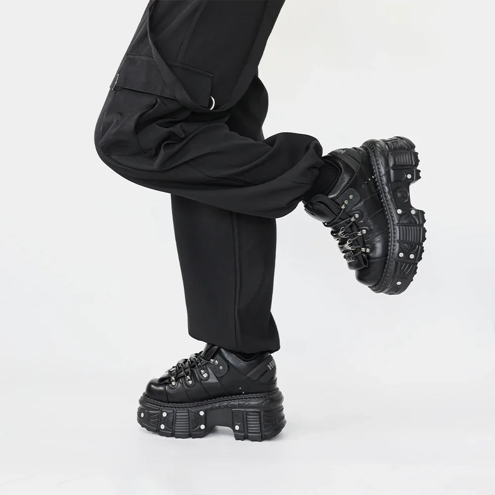 Comfortable women's black platform punk boots with secure lace-up closure for an edgy, elevated look.