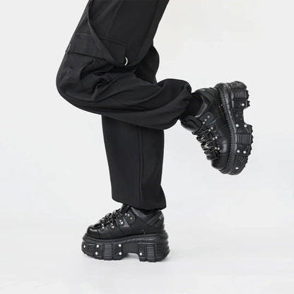 Comfortable women's black platform punk boots with secure lace-up closure for an edgy, elevated look.