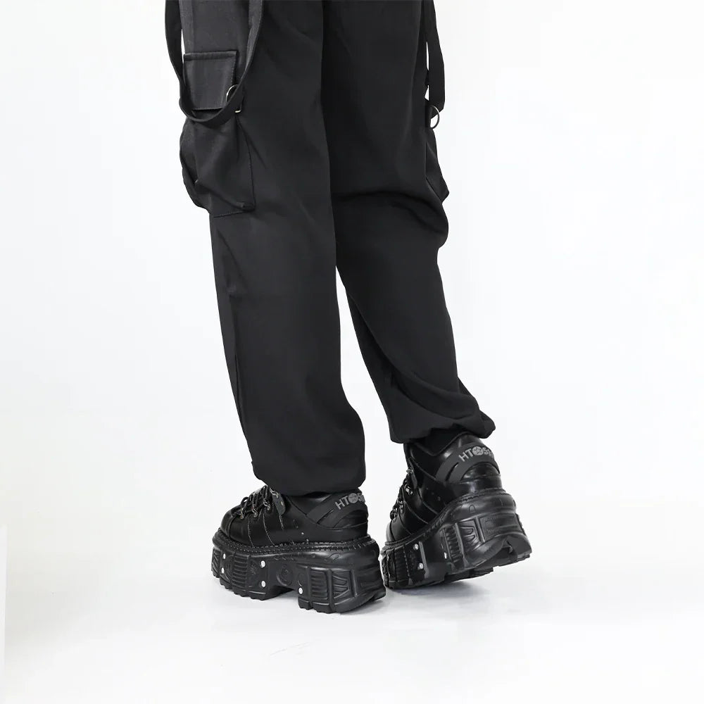 Trendy women's black punk platform boots, featuring a sturdy platform sole and intricate lace-up detailing.