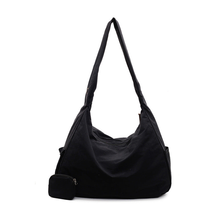 Green versatile women's shoulder bag, spacious and stylish with an integrated organizer.