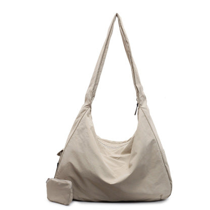 Navy blue stylish women's handbag, large capacity crossbody bag with an organizer pocket.