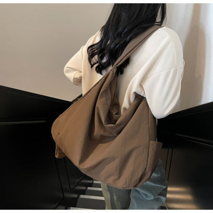 Navy blue everyday women's bag, a large capacity shoulder bag with a smart organizer.