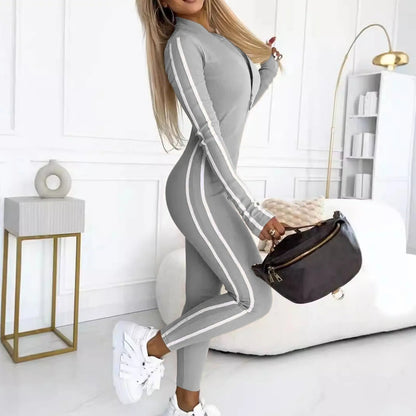 Comfortable beige women's Velocity lounge jumpsuit. Soft one-piece loungewear, ideal for relaxed active or casual days.