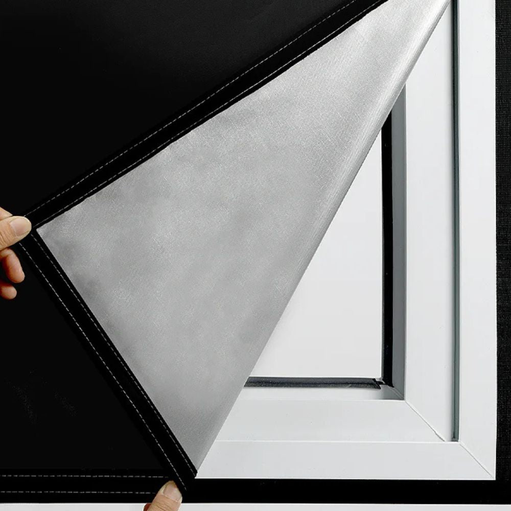 Blackout window film for heat control, UV protection, & privacy, ideal for bedroom & office.