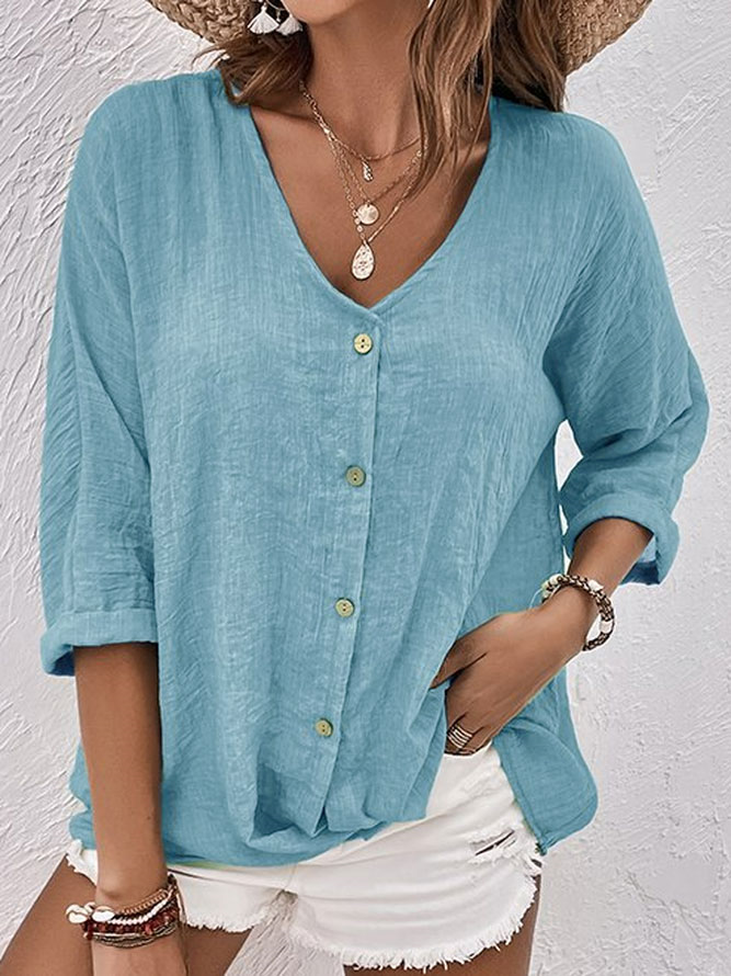 Blue women's V-neck long sleeve button-down shirt, a casual & versatile top for everyday wear.