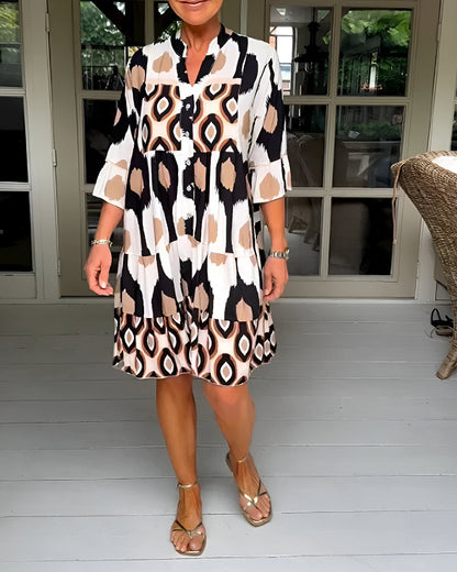 Bohemian tiered maxi dress for women, geometric print, ruffle cuffs. Perfect for summer casual or vacation.