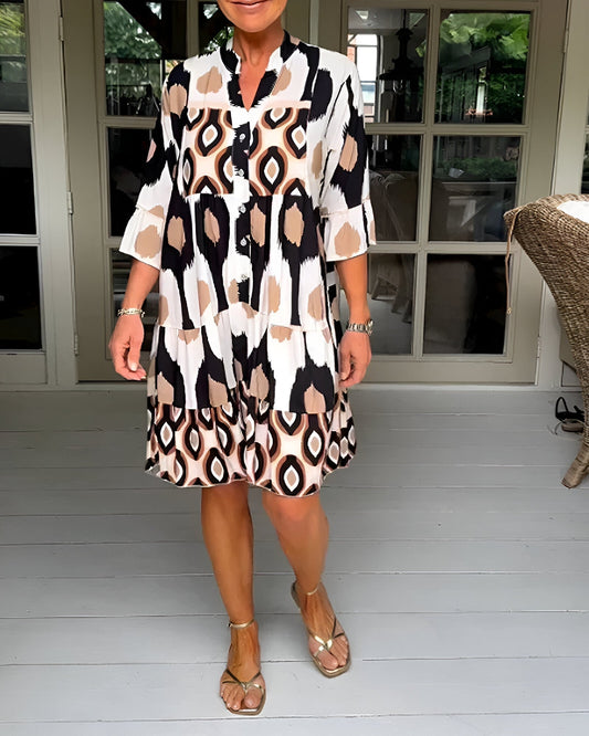 Bohemian tiered maxi dress for women, geometric print, ruffle cuffs. Perfect for summer casual or vacation.