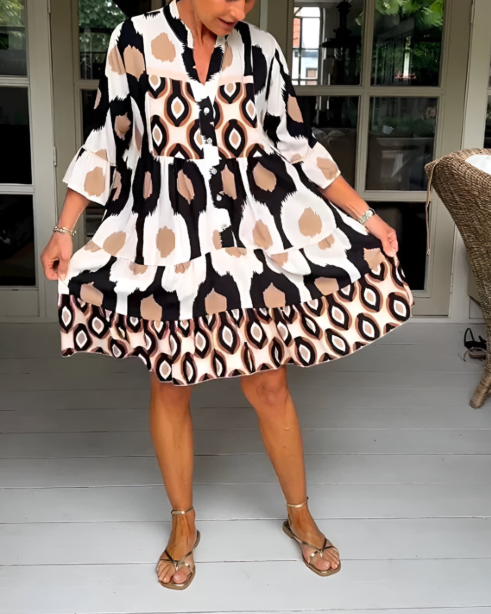 Women's A-line bohemian maxi dress with elegant tiered skirt and ruffle sleeves, ideal for spring fashion.