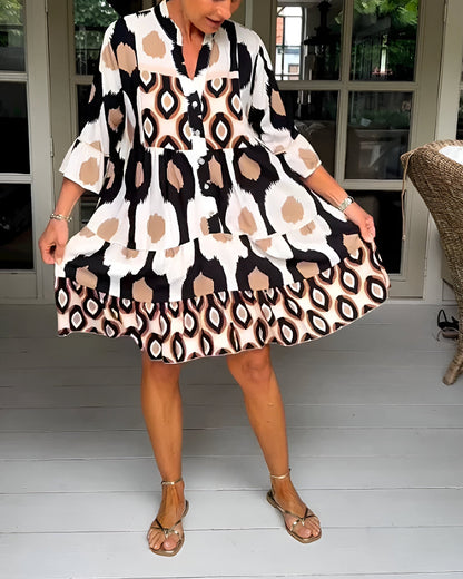 Women's A-line bohemian maxi dress with elegant tiered skirt and ruffle sleeves, ideal for spring fashion.