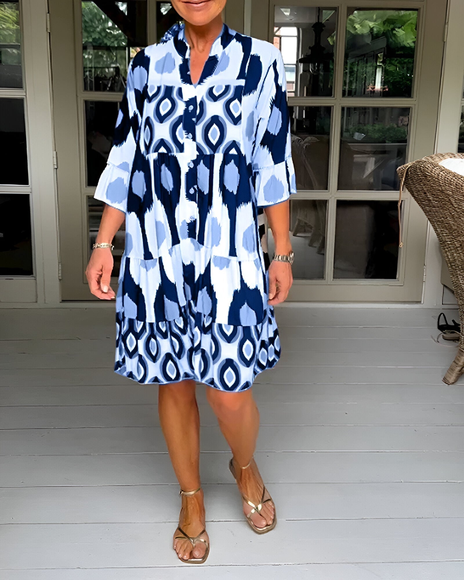 Flowing women's tiered maxi dress with bohemian style, mandarin collar & ruffle cuffs. Great for summer vacations.