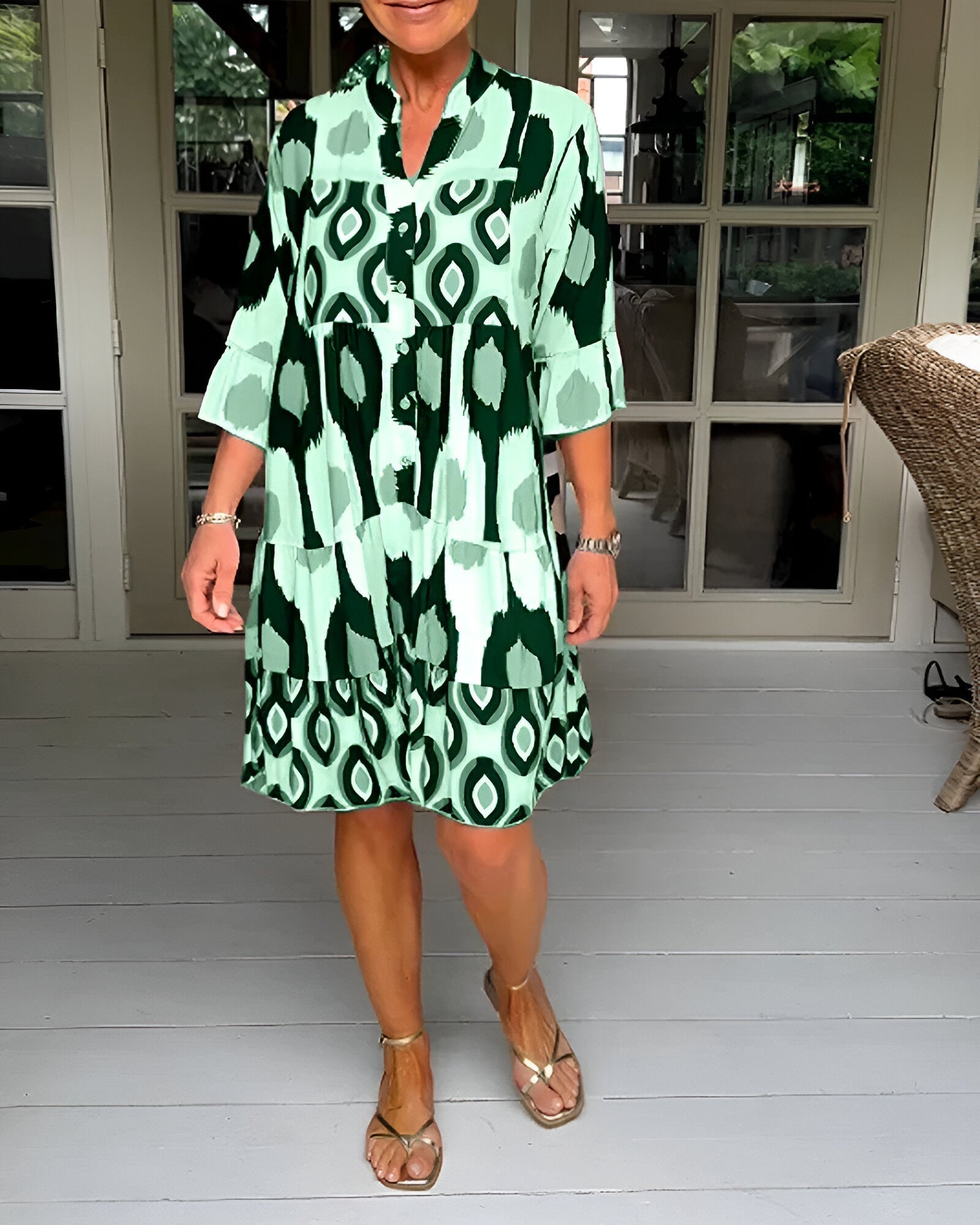 Women's bohemian tiered maxi dress, comfortable and stylish with geometric print and ruffle cuffs for spring/summer.
