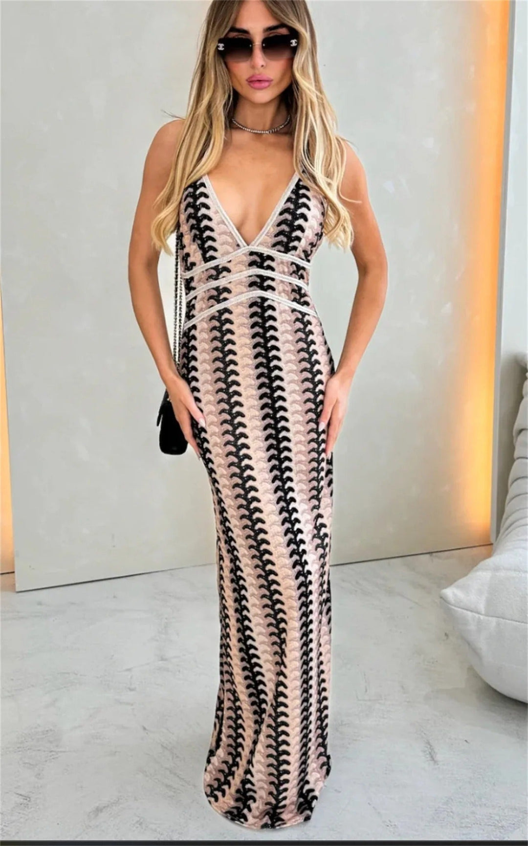 Flowy boho printed V-neck maxi dress for women, offering a comfortable & elegant style for summer events.