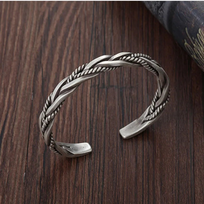 Fashionable men's silver jewelry: a twisted sterling silver cuff bracelet accessory.