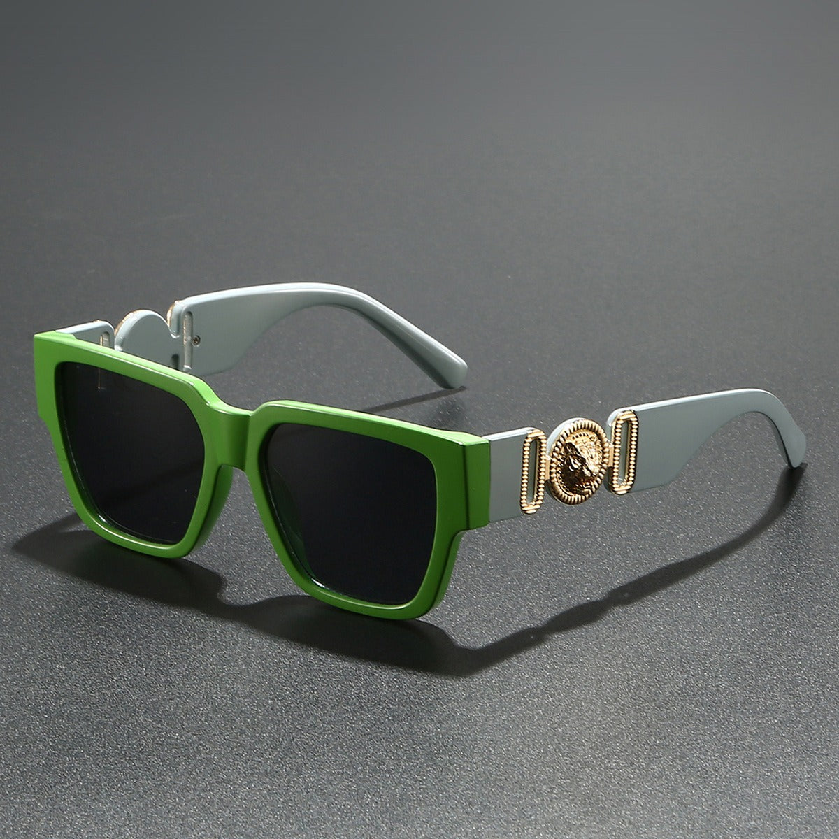 Fashionable square frame shades offering UV400 protection. Unisex design, perfect summer accessory.