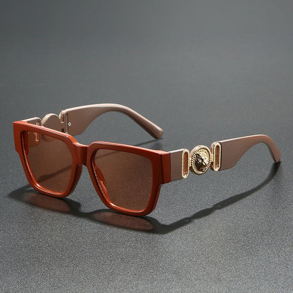 Trendy unisex sunglasses with a bold square frame. Essential UV400 eye protection for sunny days.
