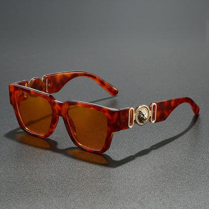 Unisex square frame shades for a bold look. UV400 protected eyewear, a trendy summer fashion accessory.
