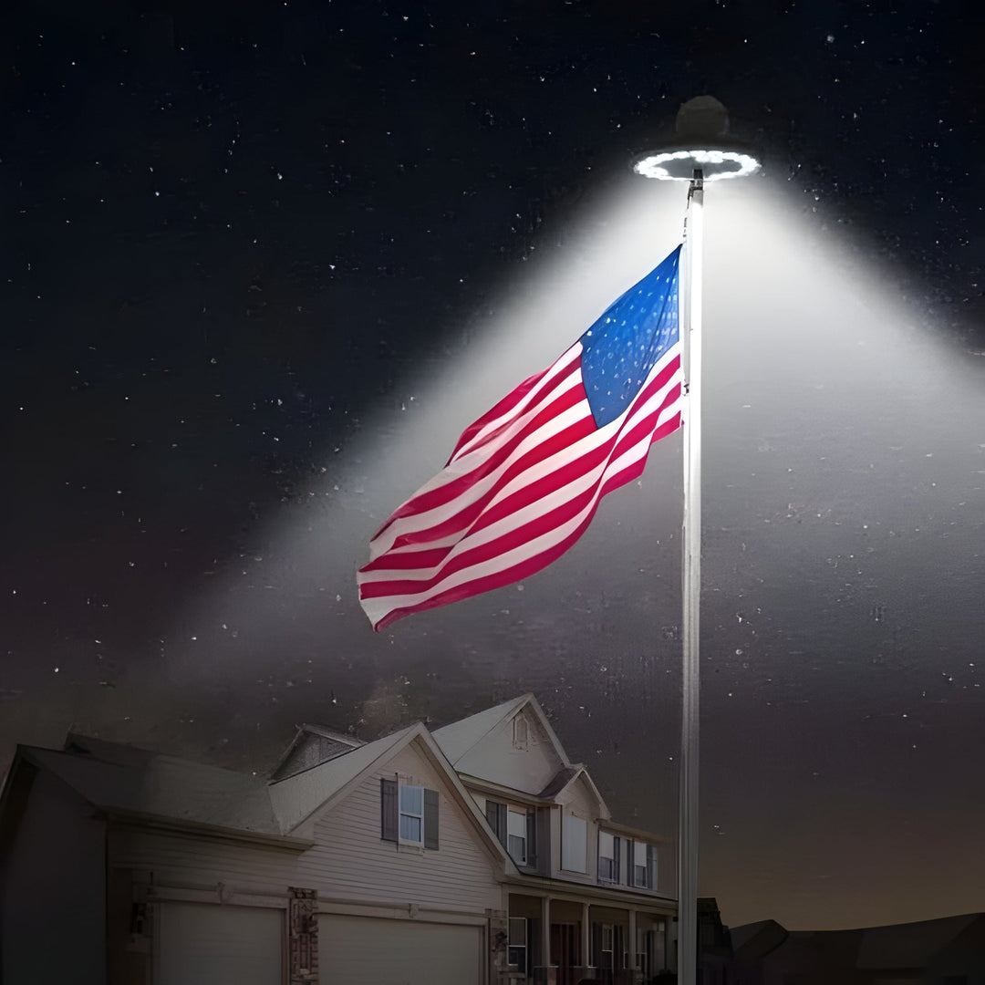Dusk to dawn solar flagpole light with bright LEDs. Energy-efficient outdoor lighting for patriotic garden flags.