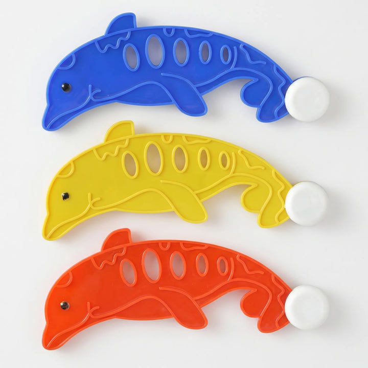 Vibrant, brightly colored ABS plastic diving toy from a kids' pool set for underwater games.