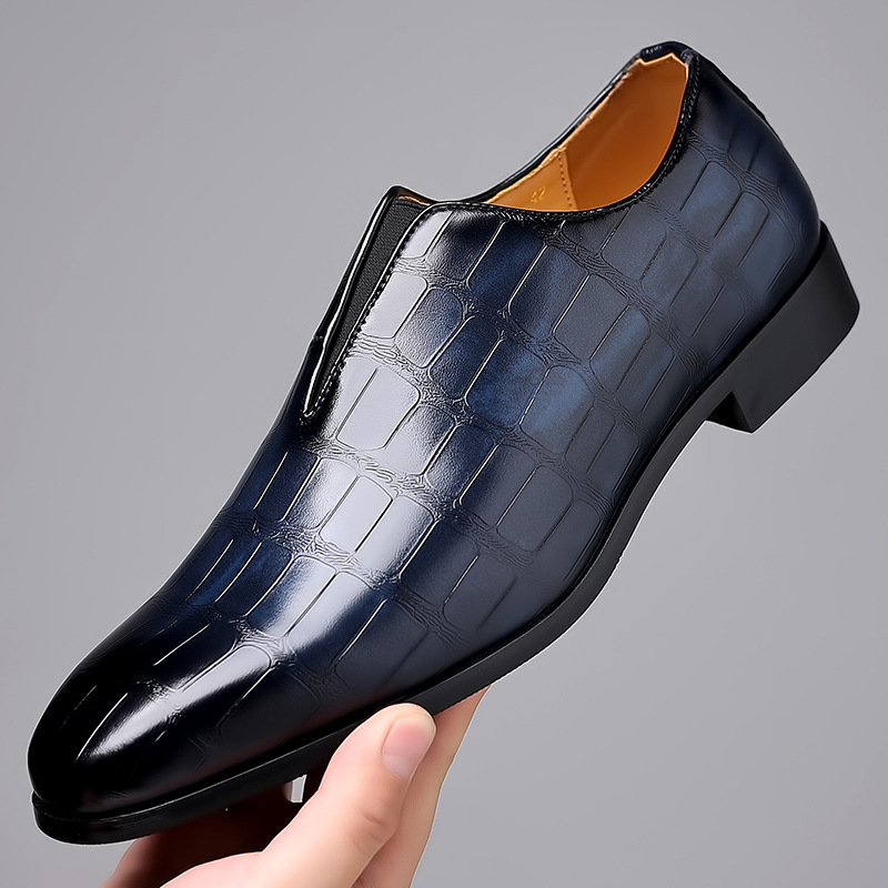 Brown sophisticated men's loafers, croc-embossed for elegant dress shoe style.