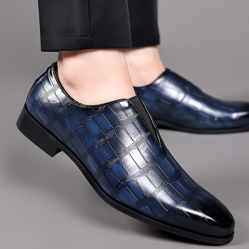 Black comfortable men's dress loafers, croc-embossed for a chic formal look.