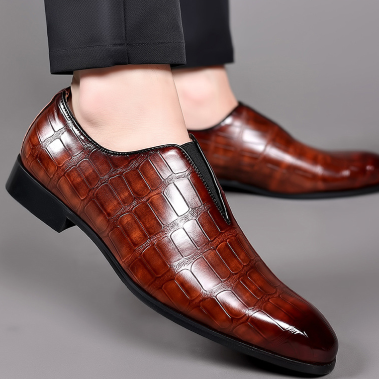 Sophisticated brown croc-embossed men's loafers, perfect for dress or casual wear.