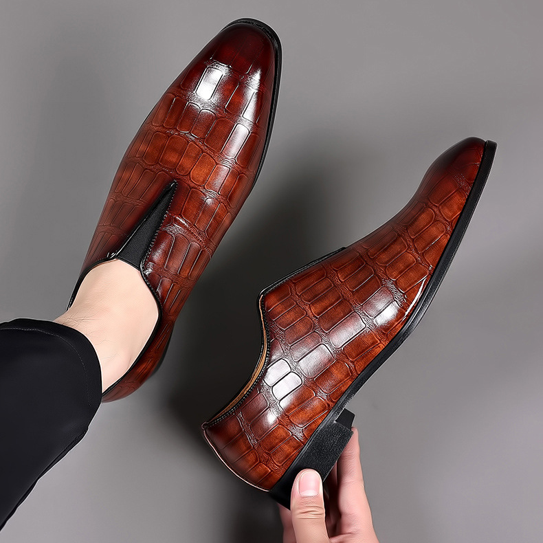 Elegant black croc-embossed dress shoes for men, formal and comfortable.