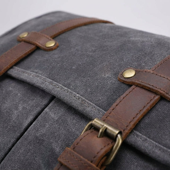 Gray genuine leather shoulder messenger bag for men. Crossbody style, organized compartments for daily essentials.
