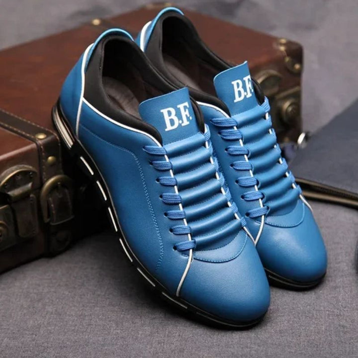 Stylish orange Men's Dax sneakers, perfect for street style. Modern, comfortable everyday men's casual footwear.