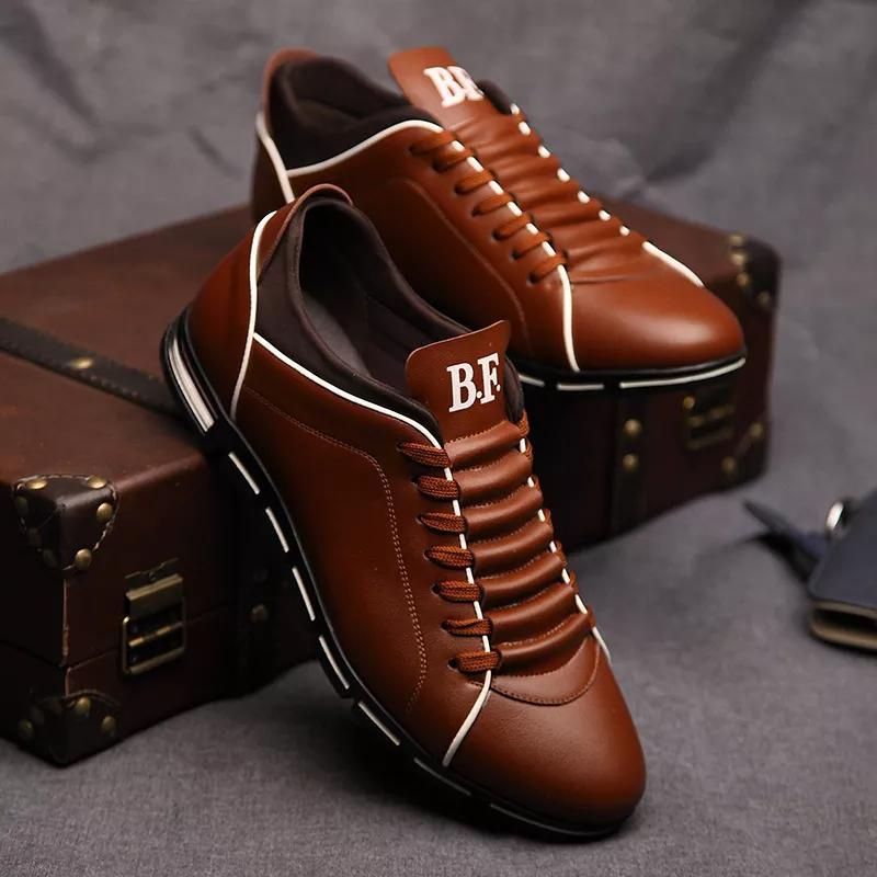 Everyday black Dax casual sneakers for men. Stylish, comfortable & versatile men's fashion footwear. Modern design.