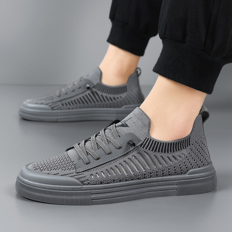 Gray lace-up men's shoes, combining lightweight comfort with athletic style for everyday.