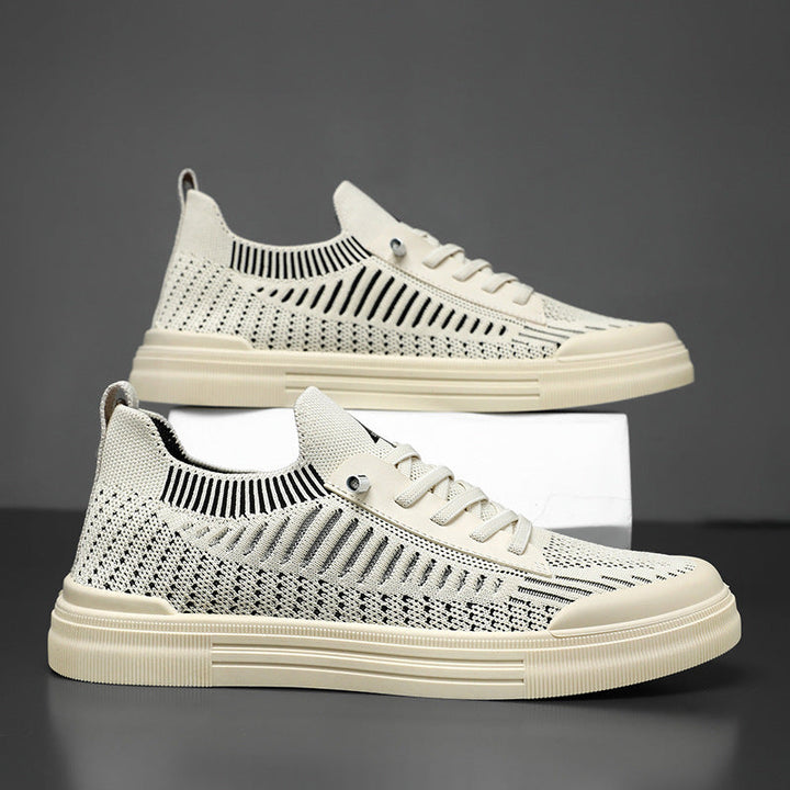 Gray athletic style men's footwear, lightweight and comfortable for everyday use.