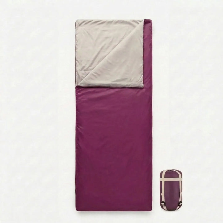 Lightweight brown envelope sleeping bag, compact design for easy carrying on camping, hiking, and outdoor travel trips.