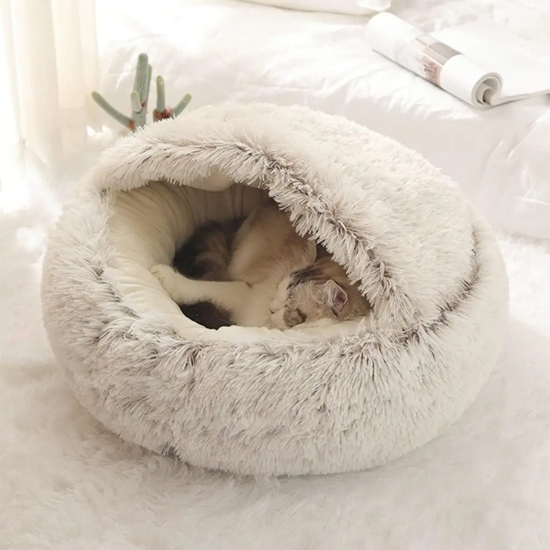 Calming dog bed with high walls for a cozy cave feel. Promotes deep relaxation & reduces pet anxiety.