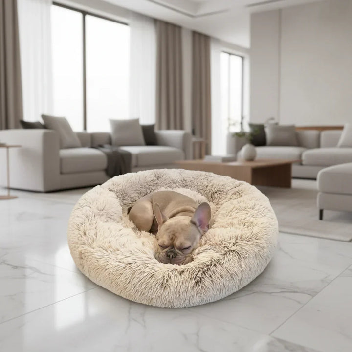 Calming dog bed for anxiety relief. Ultra-soft plush pet lounger, supportive & cozy for ultimate comfort.