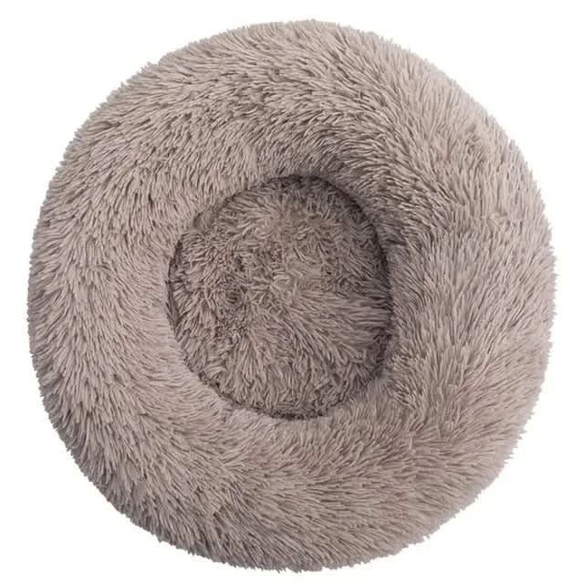 Durable plush calming dog bed. Ultra-soft pet lounger provides superior support & anxiety relief for pets.