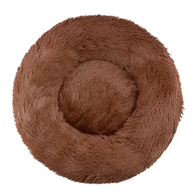 Premium dog accessory: calming pet bed. Ultra-soft & supportive lounger designed for anxiety relief & comfort.