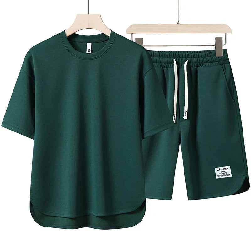 Model wearing a comfortable casual varsity shorts set. Perfect women's loungewear for warm summer days.