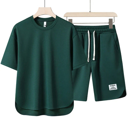 Model wearing a comfortable casual varsity shorts set. Perfect women's loungewear for warm summer days.