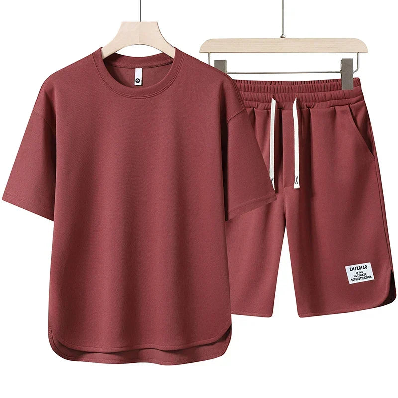 Breathable casual shorts and t-shirt set, a stylish two-piece varsity outfit for relaxed summer comfort.