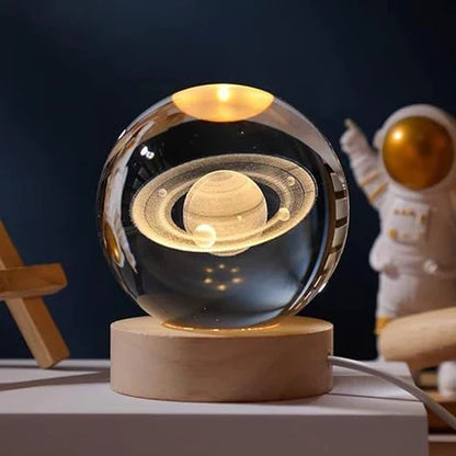 Decorative glowing sphere night light, 3D engraved with a celestial pattern, soft home lighting.