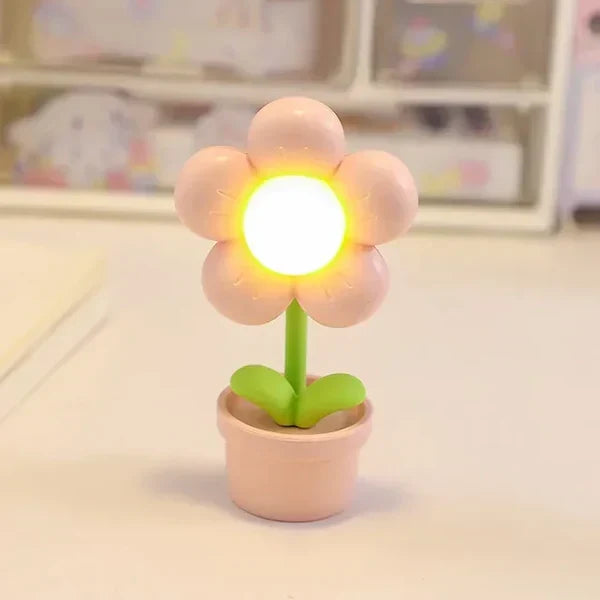 Charming LED flower table lamp, BlossomGlow, perfect for relaxing bedroom ambiance and decor.