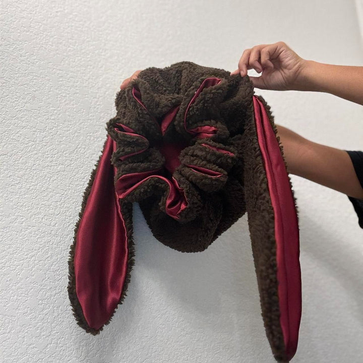 Soft women's bunny bonnet, warm headwear for winter, offering gentle hair protection and style.
