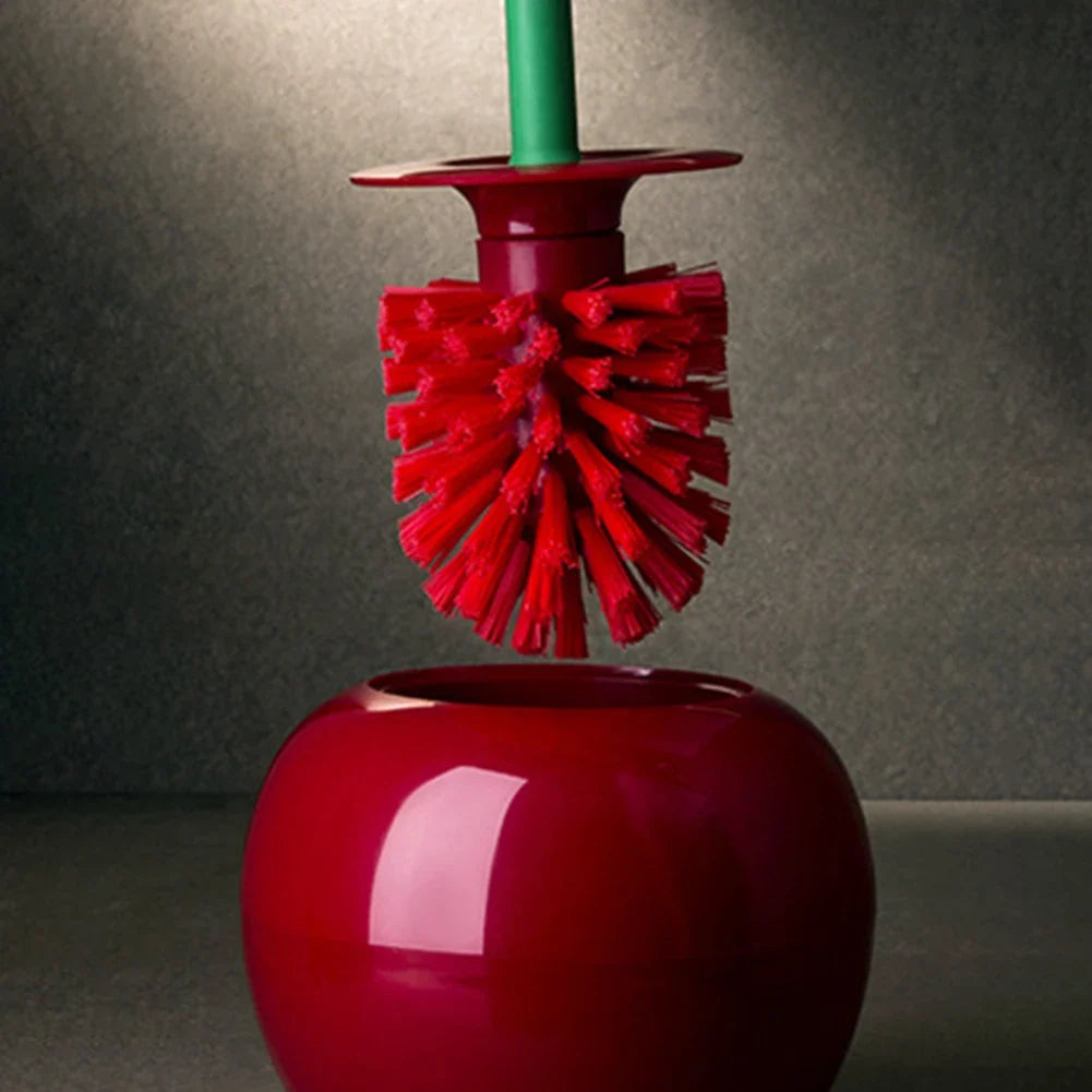 Vibrant red Cherry Bomb toilet brush with sturdy black handle for deep toilet bowl cleaning & hygiene.
