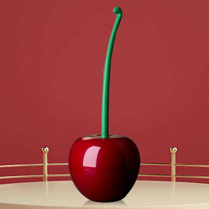 Fun Cherry Bomb toilet brush: a red & black bathroom cleaning tool for scrubbing and maintaining a fresh, hygienic home.