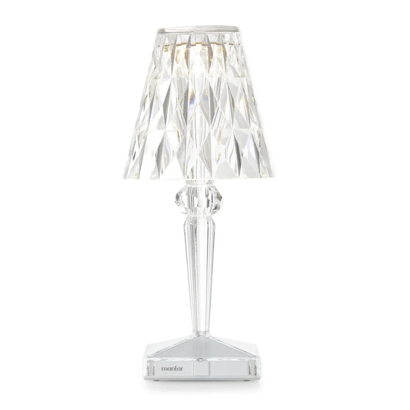 Chic crystal table lamp, providing bright, yet ambient light for a stylish interior.